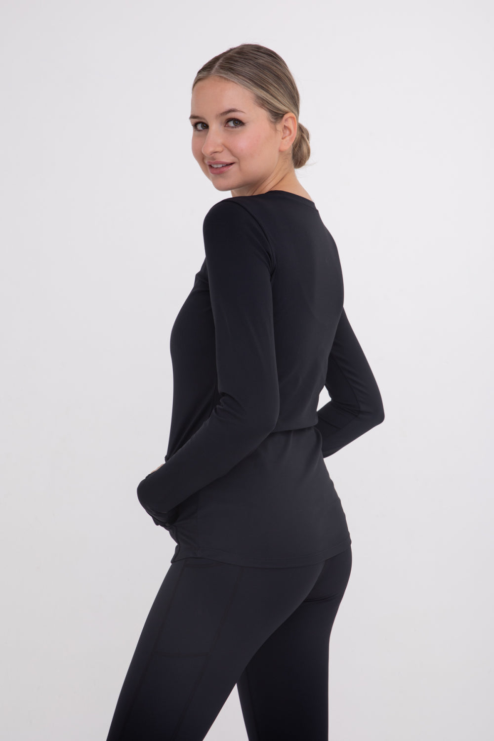 Manches longues actives avec passe-pouce incurvé